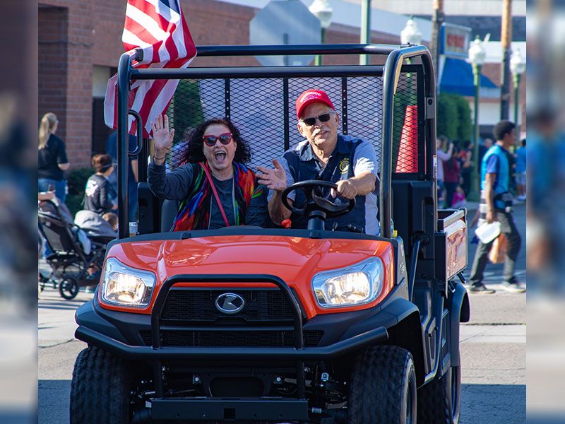 VetFest Co-chairs Nina Deerfield and Mike Frank ride in the parade
